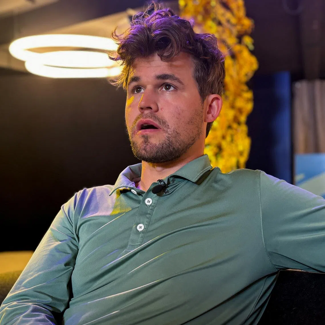 FILE PHOTO: International Chess Federation (FIDE) world number one Magnus Carlsen of Norway poses ahead of his Speed Chess Championship semi-final against Hans Niemann of the U.S., in Paris, France, September 5, 2024. REUTERS/Julien Pretot/File Photo