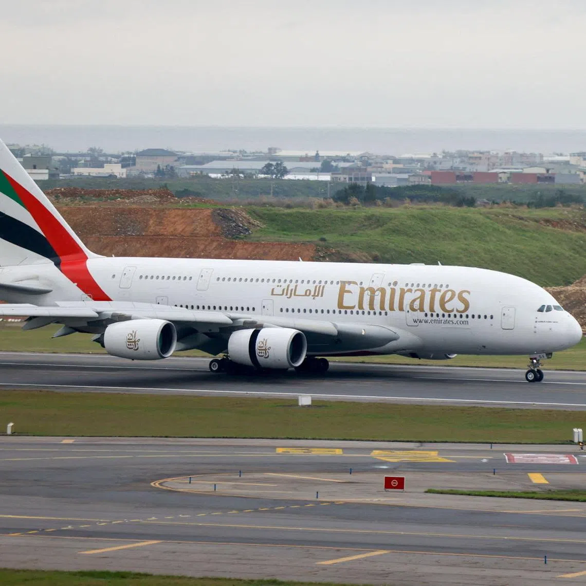 An Emirates flight departing from Dubai lands at Taoyuan International Airport, amid the U.S.-Israel conflict with Iran, in Taoyuan, Taiwan, March 5, 2026.
