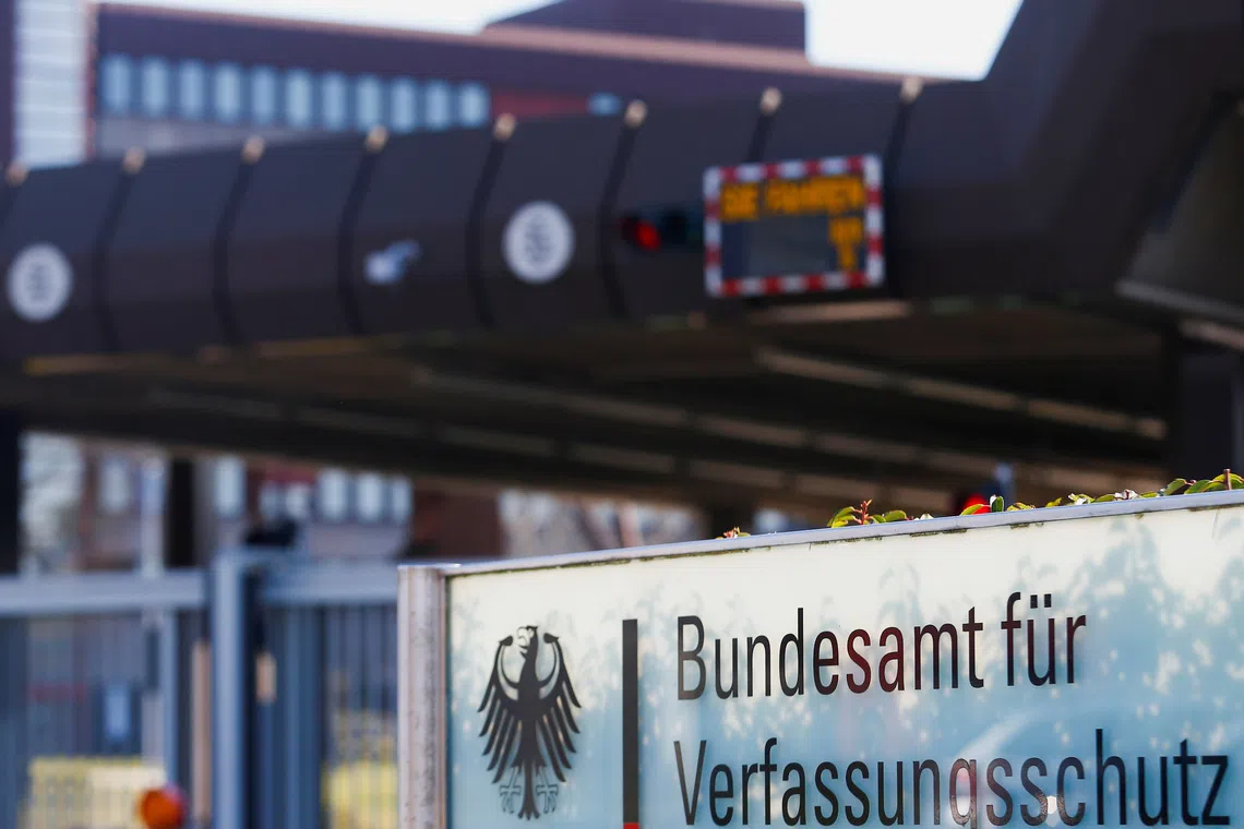 FILE PHOTO: A sign on the entrance of Germany's Federal Office for the Protection of the Constitution (Bundesamt fuer Verfassungsschutz) is pictured in Cologne, Germany March 8, 2022. REUTERS/Thilo Schmuelgen/File Photo