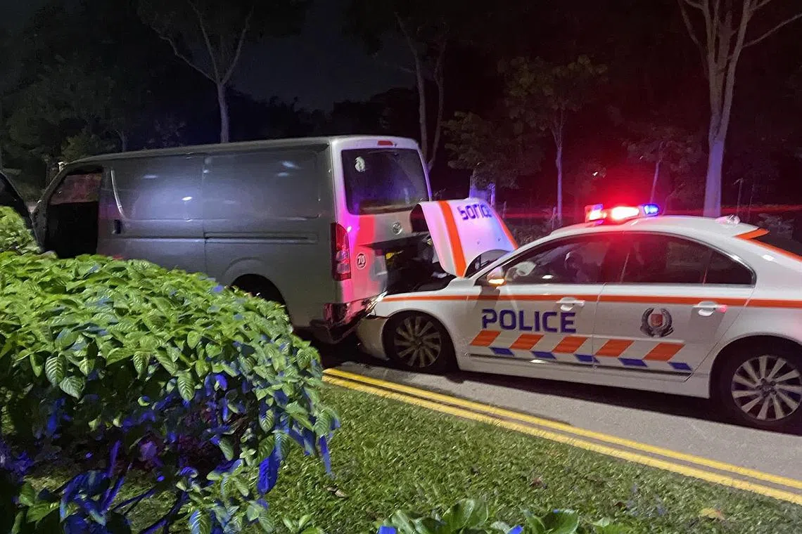 The van’s driver reversed from the roadblock point and struck a police vehicle. The driver and a female passenger then fled on foot.