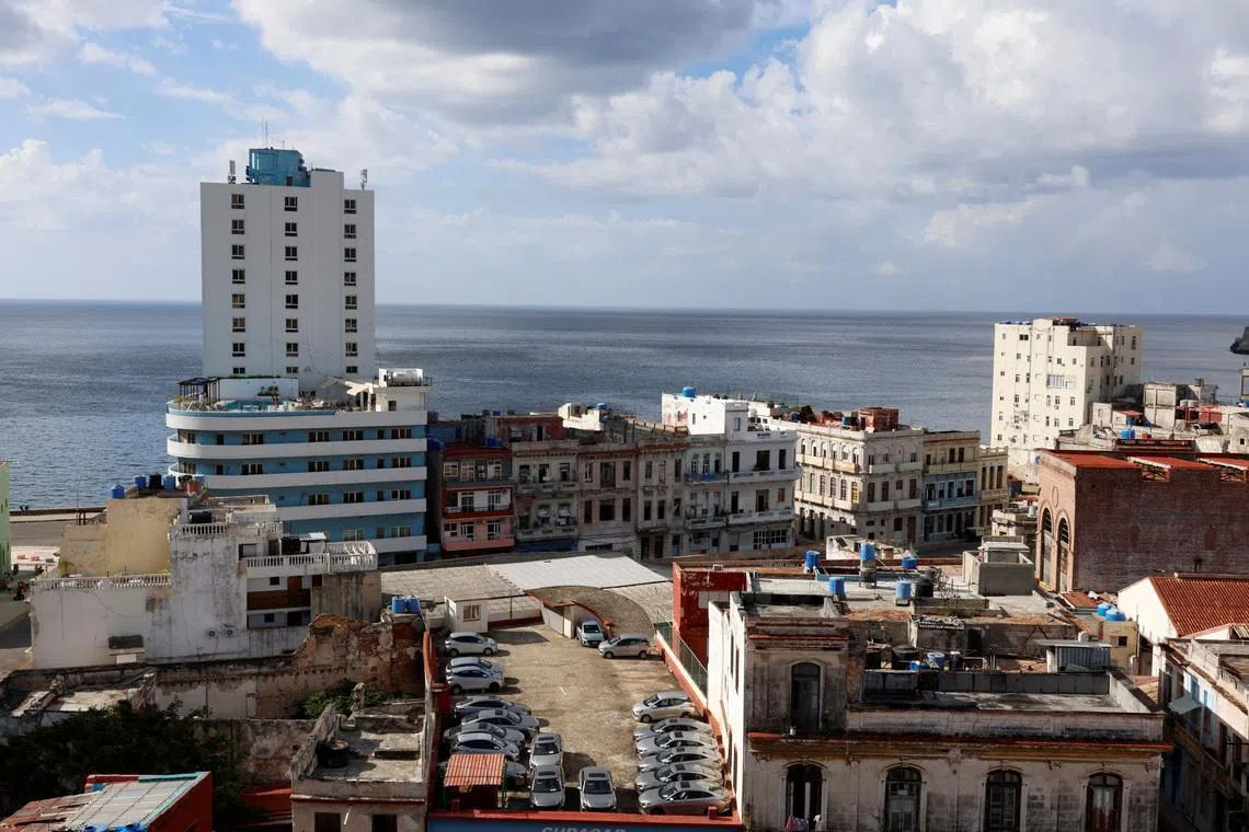 A parking lot for tourist rental cars on a rooftop amidst residential buildings before the Cuban government presents far-reaching economic measures that could mark the most significant shift toward a market economy since the 1959 revolution, in Havana, Cuba June 17, 2026. REUTERS/Norlys Perez