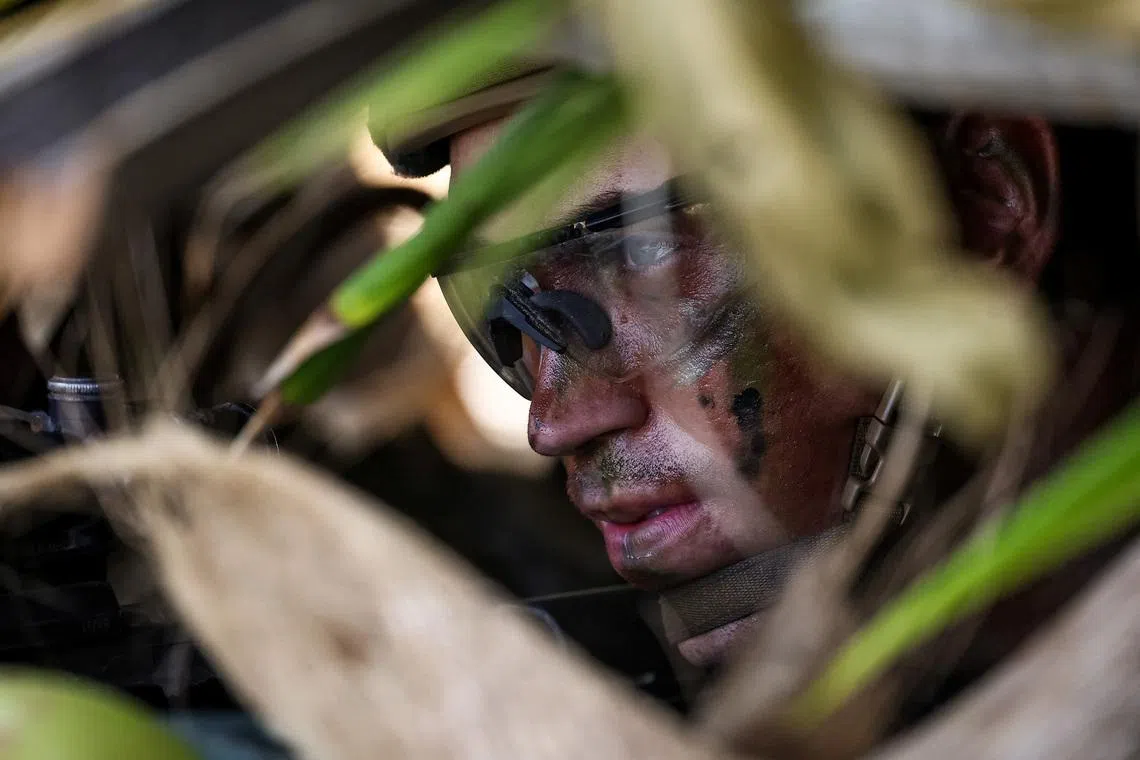 A US soldier in a foxhole participating in counter-landing live-firing exercises during Balikatan, the annual joint military exercises between the U.S. and the Philippines, at Long Point Beach, Brgy. Aporawan, Aborlan, Palawan, Philippines, on April 27, 2026. 