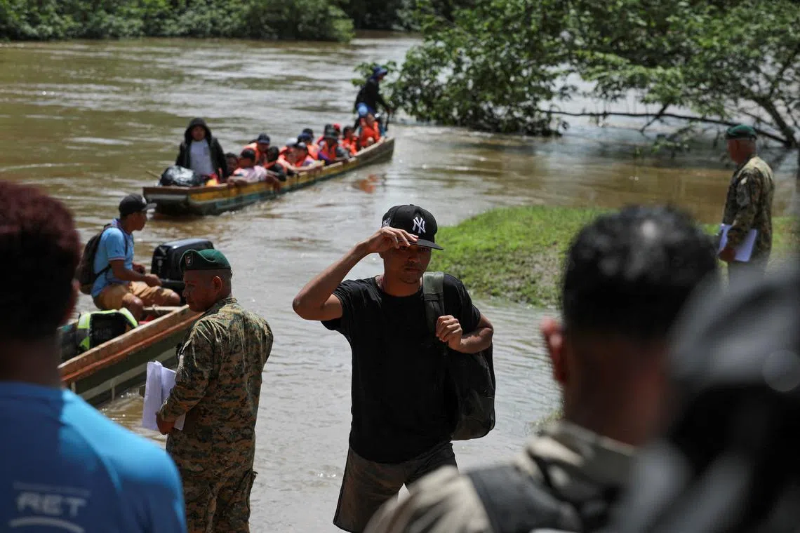FILE PHOTO: Migrants arrive at the Migrants Reception Station, during a visit by Panama's President-elect Juan Raul Mulino (not pictured), in Lajas Blancas, Darien province, Panama, June 28, 2024. REUTERS/Aris Martinez/File Photo
