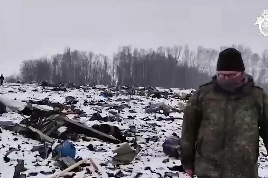 Debris can be seen from a Russian military transport plane carrying prisoners of war from Ukraine that crashed on Jan 24.