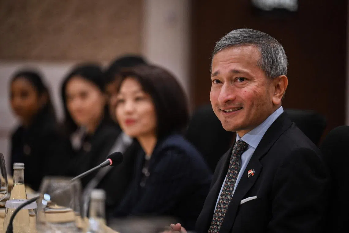Foreign Minister Vivian Balakrishnan (right) sees many areas of economic opportunities between Singapore and Manila.