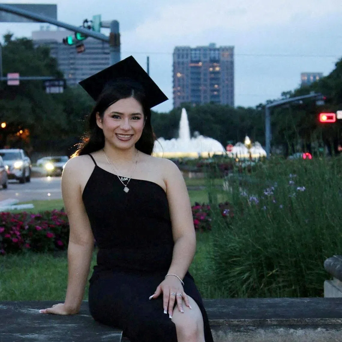 Babson College student Any Lucia Lopez Belloza poses wearing a mortarboard after graduating from high school in Boston, Massachusetts, U.S., in 2025. massdeportationdefense.org/Handout via REUTERS