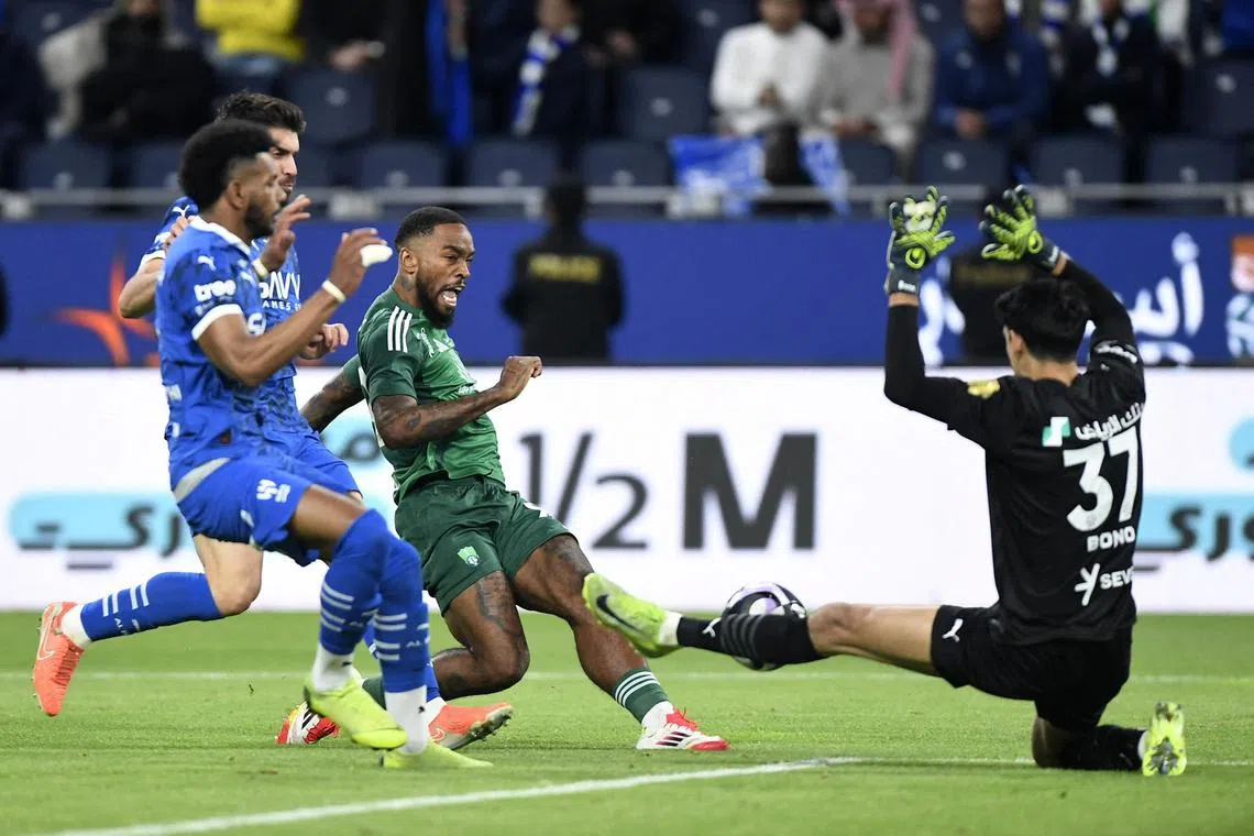 Al Ahli striker Ivan Toney scoring their first goal against Al Hilal in a Saudi Pro League game in February.
