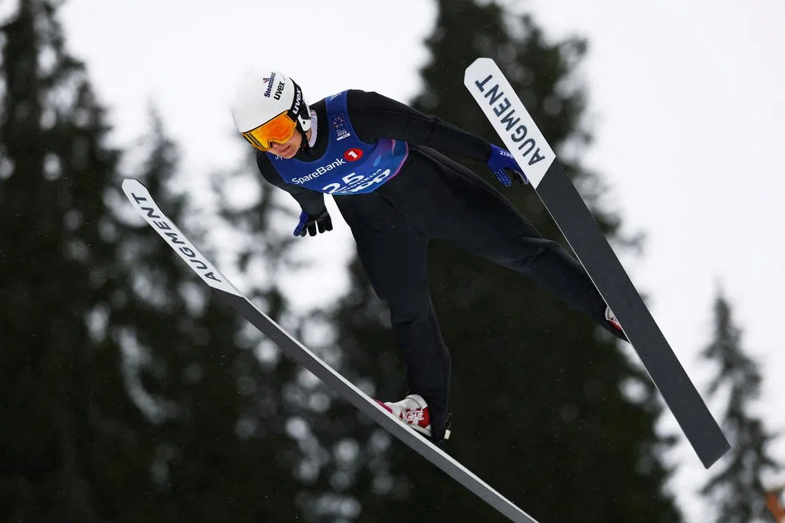 FILE PHOTO: Nordic Skiing - FIS Nordic World Ski Championships - Nordic Combined - Trondheim, Norway - March 2, 2025 Annika Malacinski of the U.S. in action during the Women's Individual Gundersen HS102 - Competition Round REUTERS/Kai Pfaffenbach/File Photo