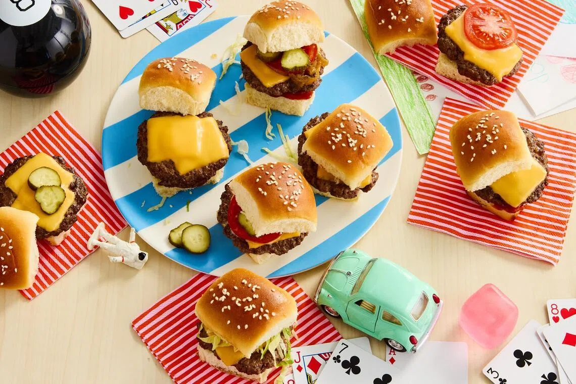 HEADLINE: Sliding Toward Summer
CAPTION: Cheeseburger Sliders. End-of-school year chaos has arrived. These 20-minute (or less) meals will get you cooking through it. Food styled by Monica Pierini. Prop styled by Megan Hedgpeth.
CREDIT: (Ryan Liebe/The New York Times)