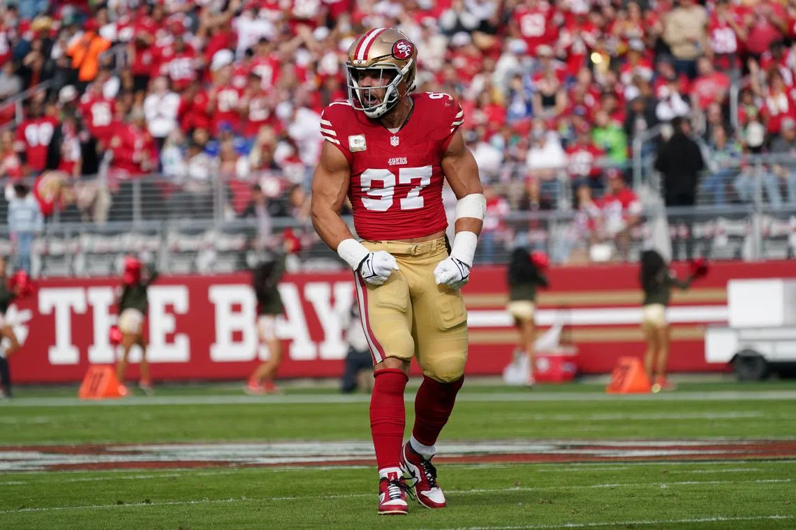 Nov 17, 2024; Santa Clara, California, USA; San Francisco 49ers defensive end Nick Bosa (97) celebrates after sacking Seattle Seahawks quarterback Geno Smith (7) in the first quarter at Levi's Stadium. Mandatory Credit: David Gonzales-Imagn Images