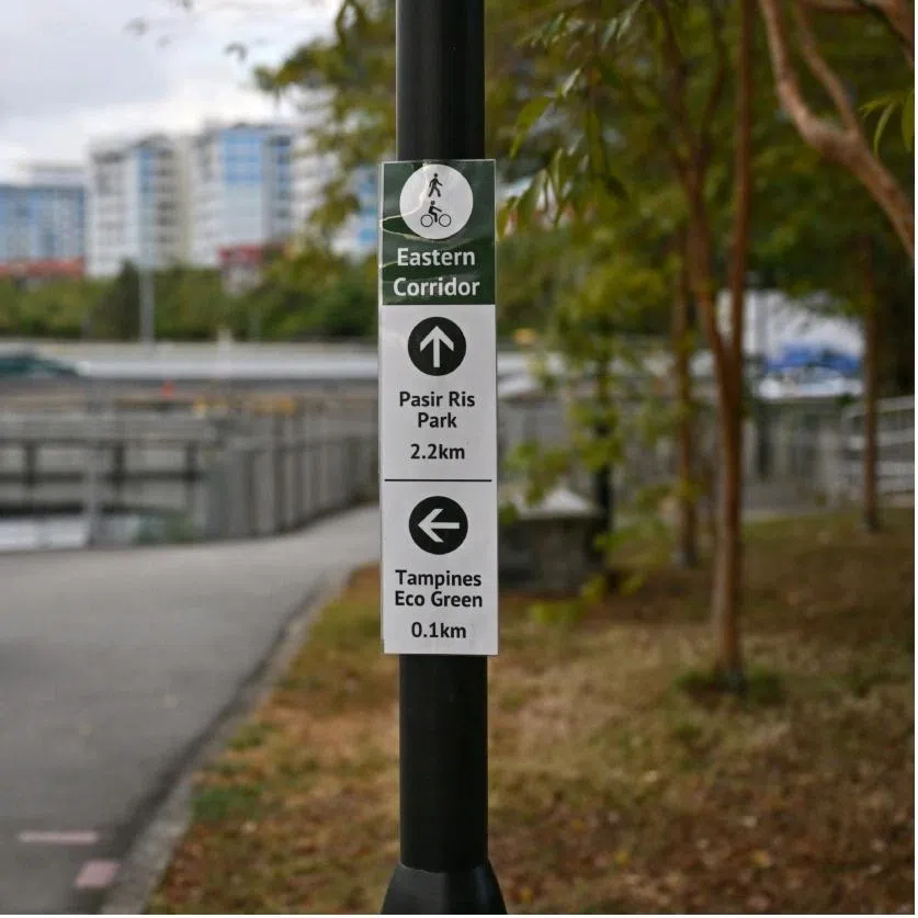Since 2020, Mr Vareck Ng (left) has been putting up about 100 unofficial wayfinding signs across the island.