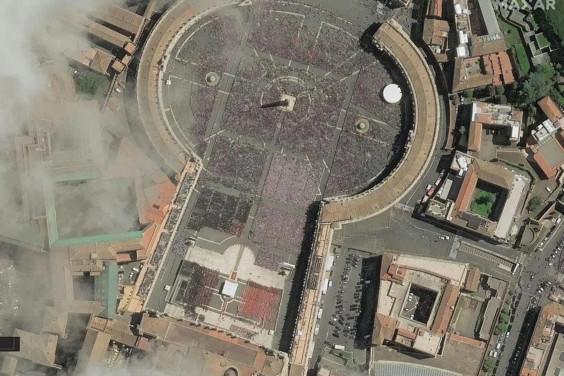 This satellite image taken and released on April 26, 2025 shows a crowd-filled St. Peter's Square during the Pope's funeral. 
