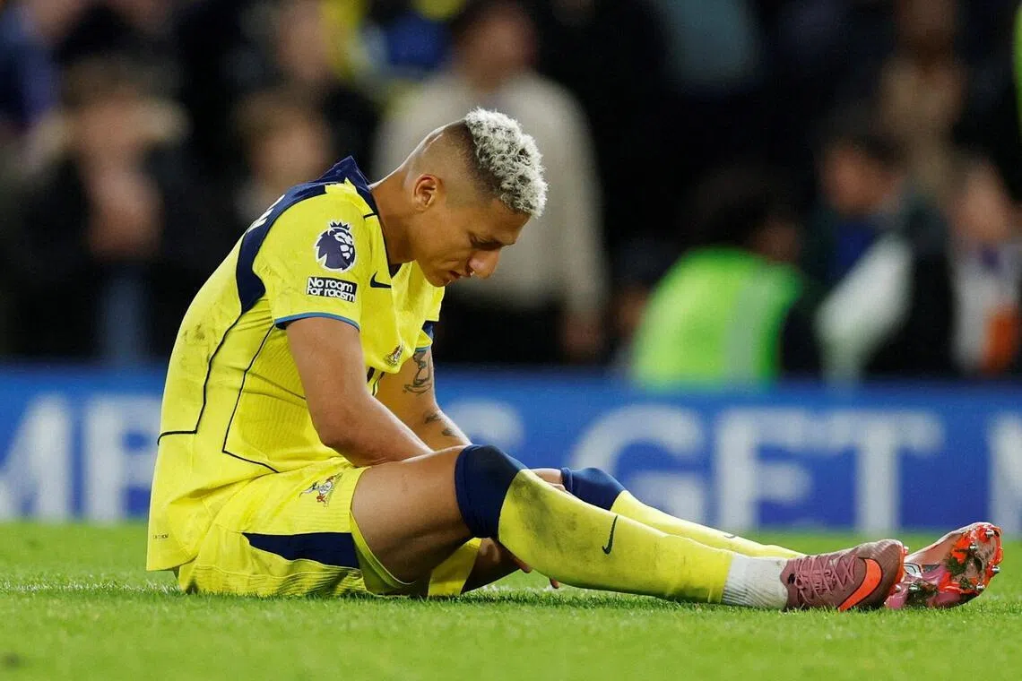 Tottenham Hotspur's Richarlison sitting on the pitch dejected after his side's 2-1 defeat by Chelsea on May 19, when he scored Spurs' only goal. 