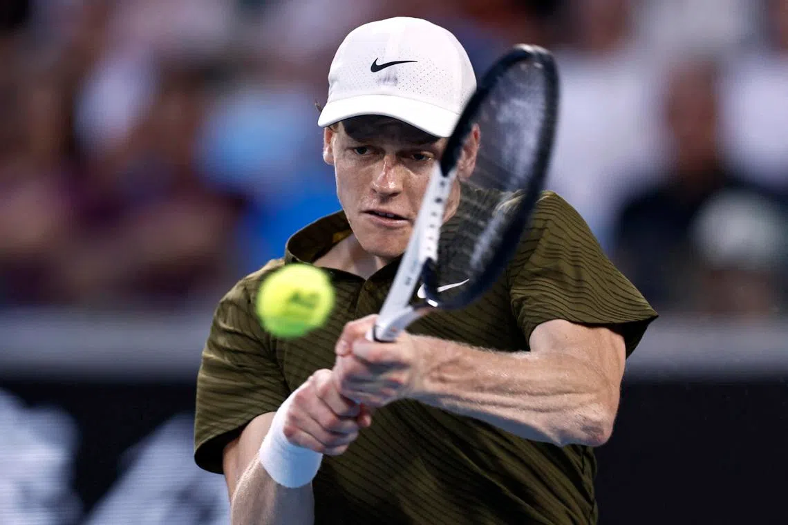 Tennis - Australian Open - Melbourne Park, Melbourne, Australia - January 26, 2026 Italy's Jannik Sinner in action during his fourth round match against Italy's Luciano Darderi REUTERS/Tingshu Wang