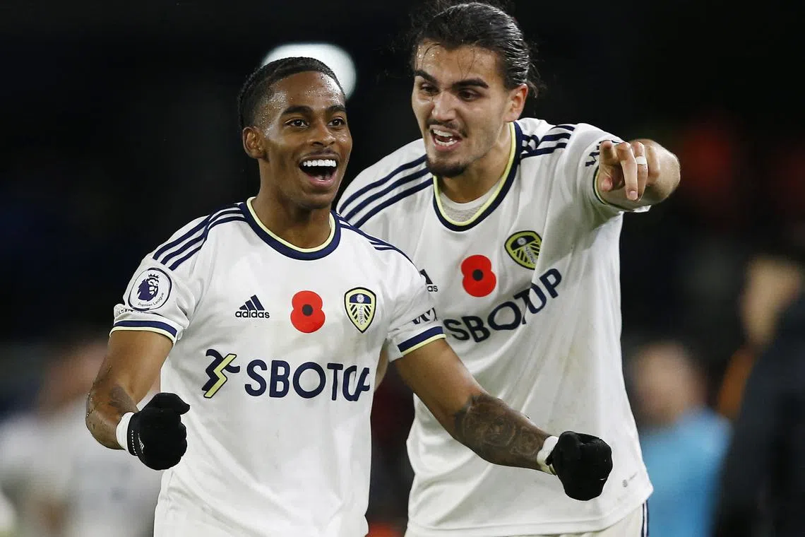 Leeds United's Crysencio Summerville celebrates scoring their fourth goal with teammate Pascal Struijk.
