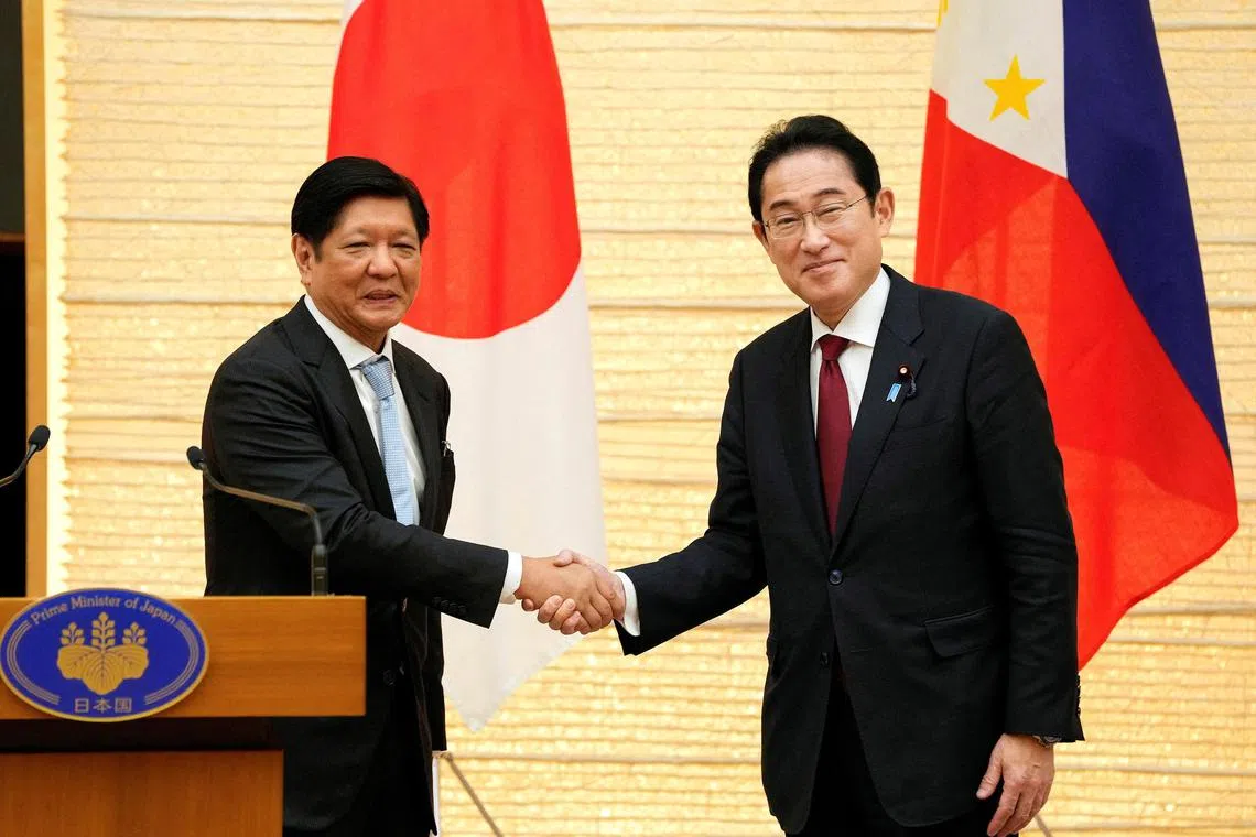 FILE PHOTO: Philippine President Ferdinand Marcos Jr. and Japanese Prime Minister Fumio Kishida (R) conclude their joint press remarks after their talks at prime minister's official residence in Tokyo, Japan, 09 February 2023. KIMIMASA MAYAMA/Pool via REUTERS/File Photo
