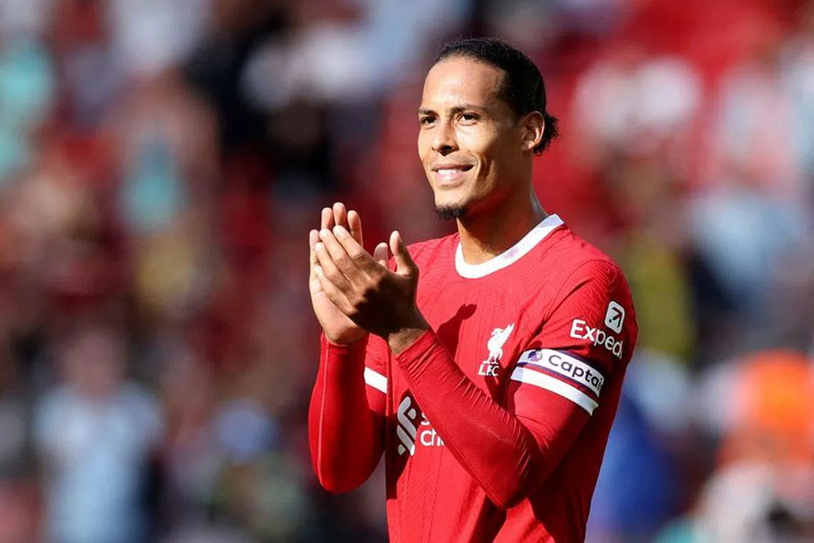 FILE PHOTO: Soccer Football - Premier League - Liverpool v AFC Bournemouth - Anfield, Liverpool, Britain - August 19, 2023 Liverpool's Virgil van Dijk applauds fans after the match REUTERS/David Klein /File Photo