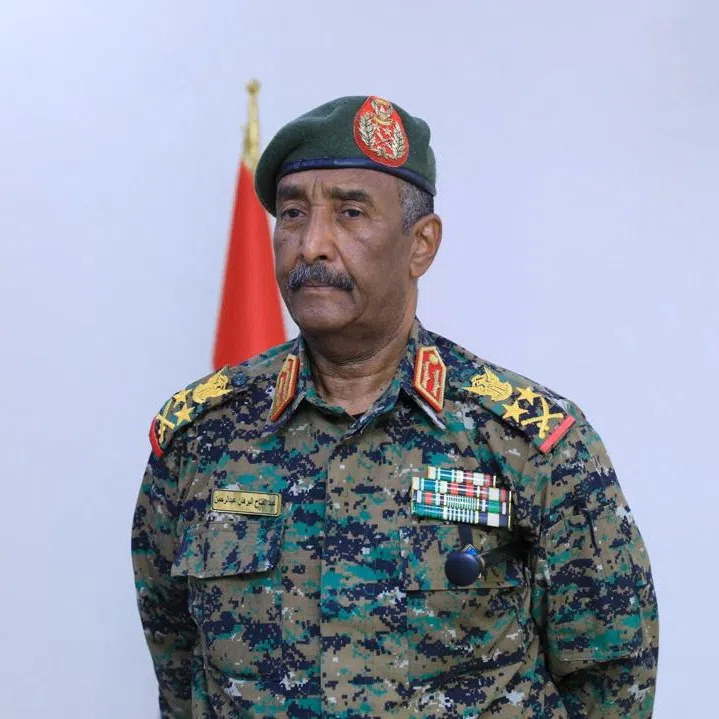FILE PHOTO: Sudan army chief, Abdel Fattah al-Burhan, attends former UN official Kamil Idris swearing-in ceremony, as Sudan's new prime minister, in Port Sudan, Sudan, May 31, 2025. Sudan Transitional Sovereignty Council/Handout via REUTERS/File Photo