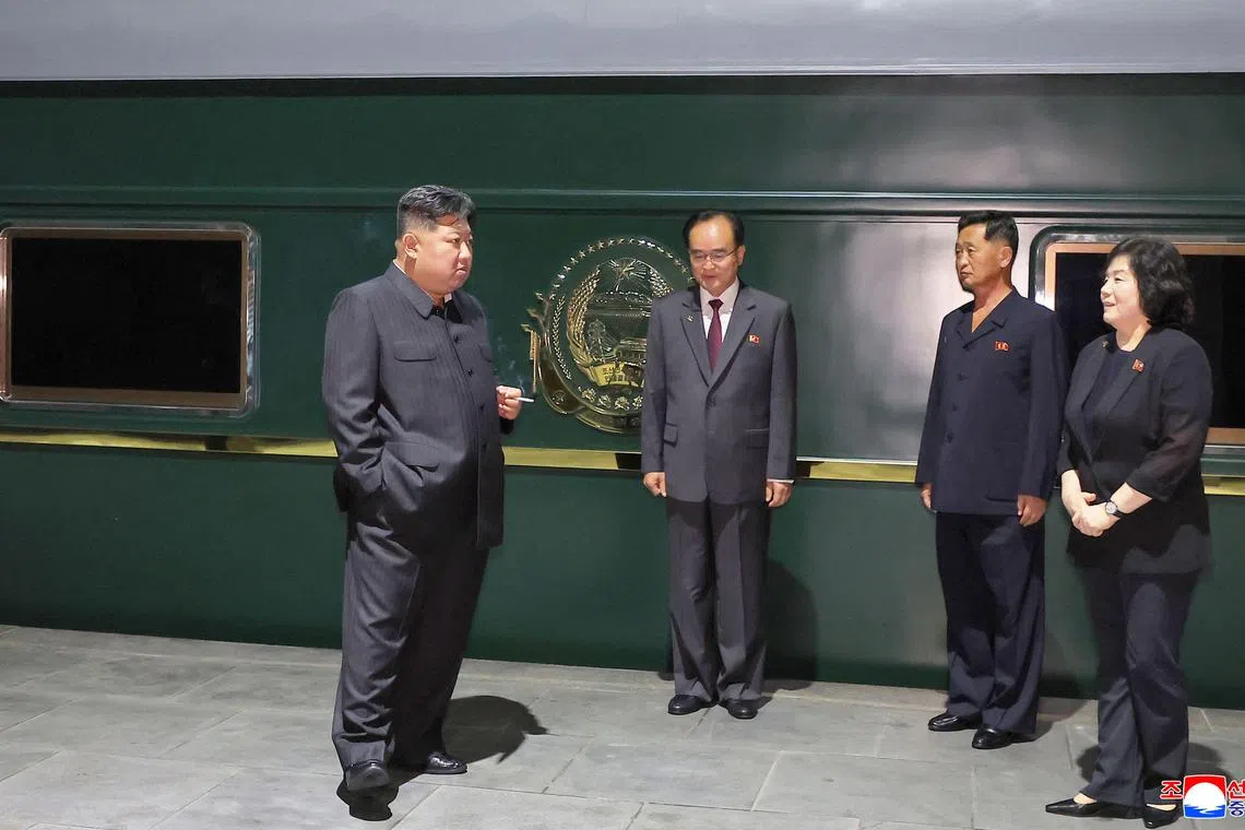 North Korea's leader Kim Jong Un (left) is seen before he departs from Pyongyang by special train to visit China, on Sept 1, 2025.