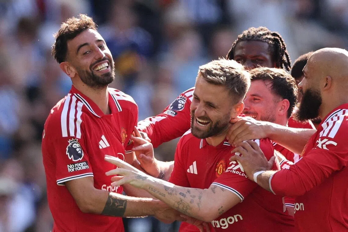 Manchester United's Bruno Fernandes (left) celebrates scoring their third goal with Luke Shaw, Bryan Mbeumo, Mason Mount and Patrick Dorgu after a VAR review.