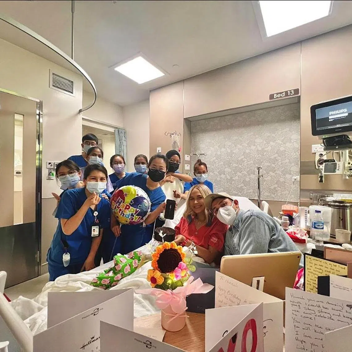 Mrs Hannah Thomas (second from right) received an infusion of CAR-T therapy cells in December 2023, just a day before her birthday, as part of the experimental treatment for T-cell acute lymphoblastic leukaemia.