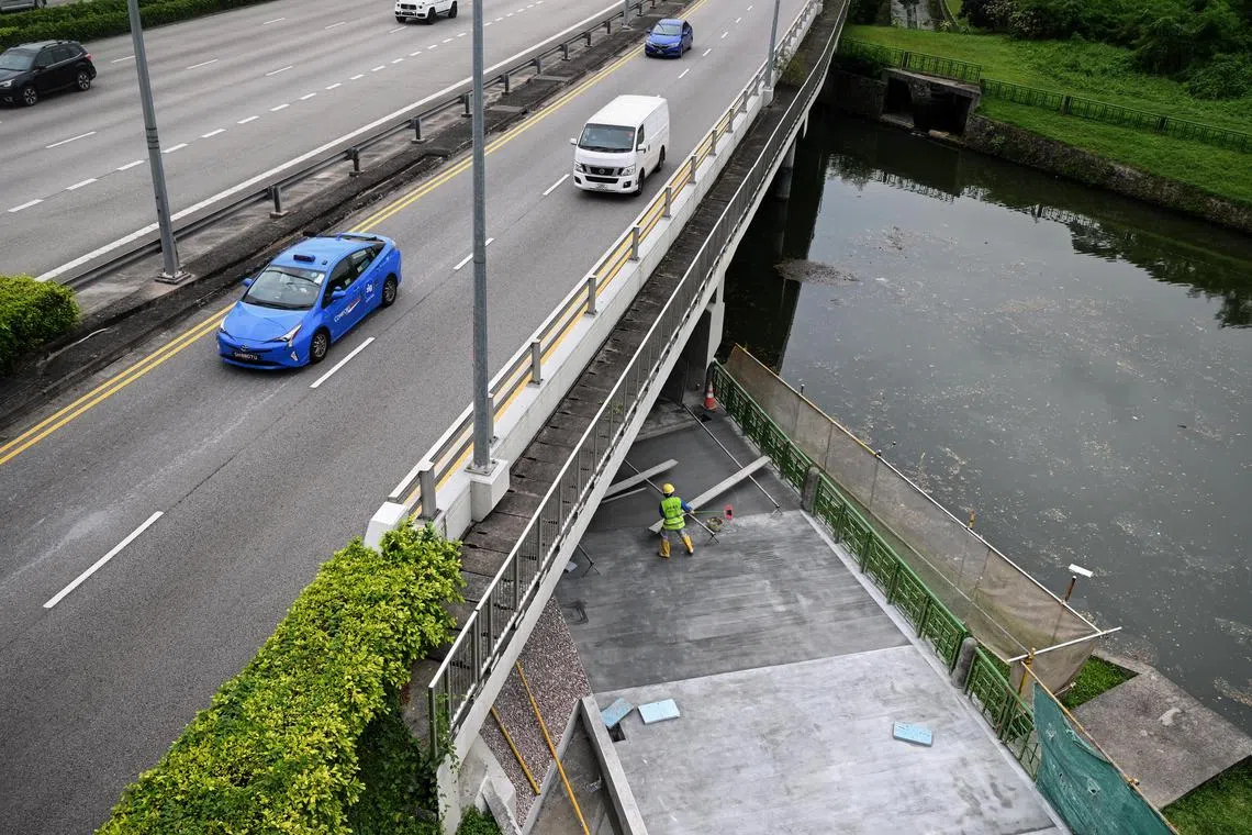 ST20230420_202305298793 Kua Chee Siong/ rlura20/
Construction at the underpass beneath the Central Expressway at the side of Potong Pasir on April 20, 2023.
URA to give an update on the Bishan-city cycling route in response to a ST forum letter writer who said: "I would say that a commute from Bishan to the CBD today is no faster than it was eight years ago." The writer, Kevin Lim, mentions obstructions along the PCN that adds to the inconvenience and longer time taken for cyclists travelling from Bishan into the CBD. "The underpass beneath the Central Expressway between Toa Payoh and Potong Pasir, which did not present an issue except for slightly low headroom, has been closed since the third quarter of 2021 and is still not open. The required detour means the rider has to dismount and push the bicycle across an overhead bridge."
