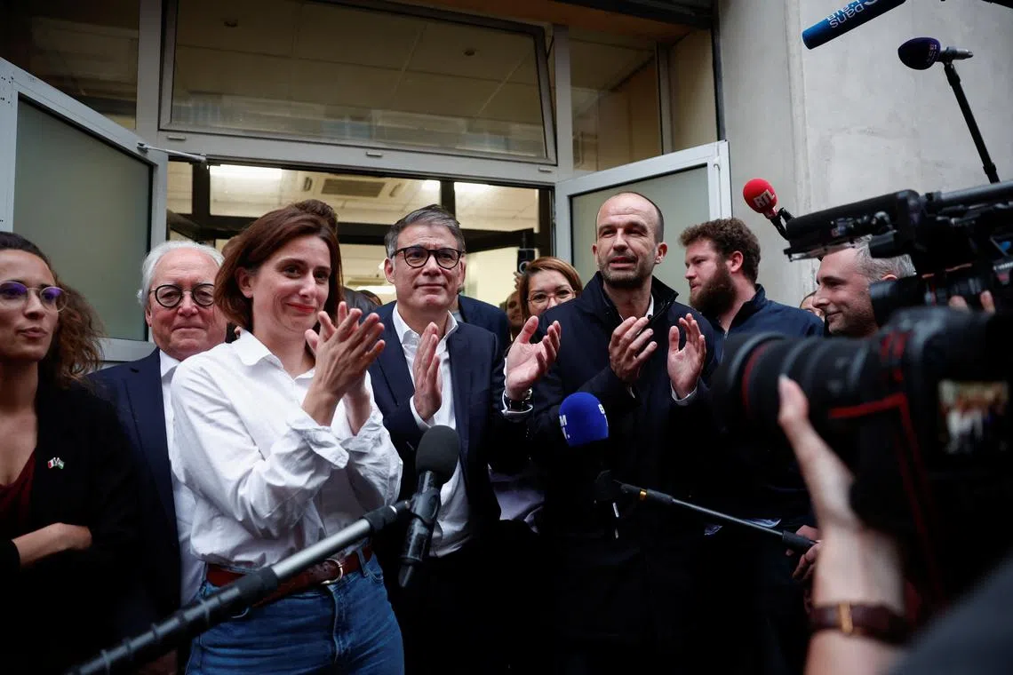FILE PHOTO: Olivier Faure, First Secretary of the French Socialist Party, Manuel Bompard, coordinator of the operational team of the French far-left opposition party La France Insoumise (France Unbowed - LFI) Marine Tondelier, National Secretary of Les Ecologistes (The Ecologists - Greens) party, pose for a picture after the announcement of the alliance of left-wing parties, called the \"Front Populaire\" (Popular Front) for their joint candidates in forthcoming parliamentary elections, at the Ecologistes party headquarters in Paris, France, June 13, 2024. REUTERS/Stephane Mahe/File Photo