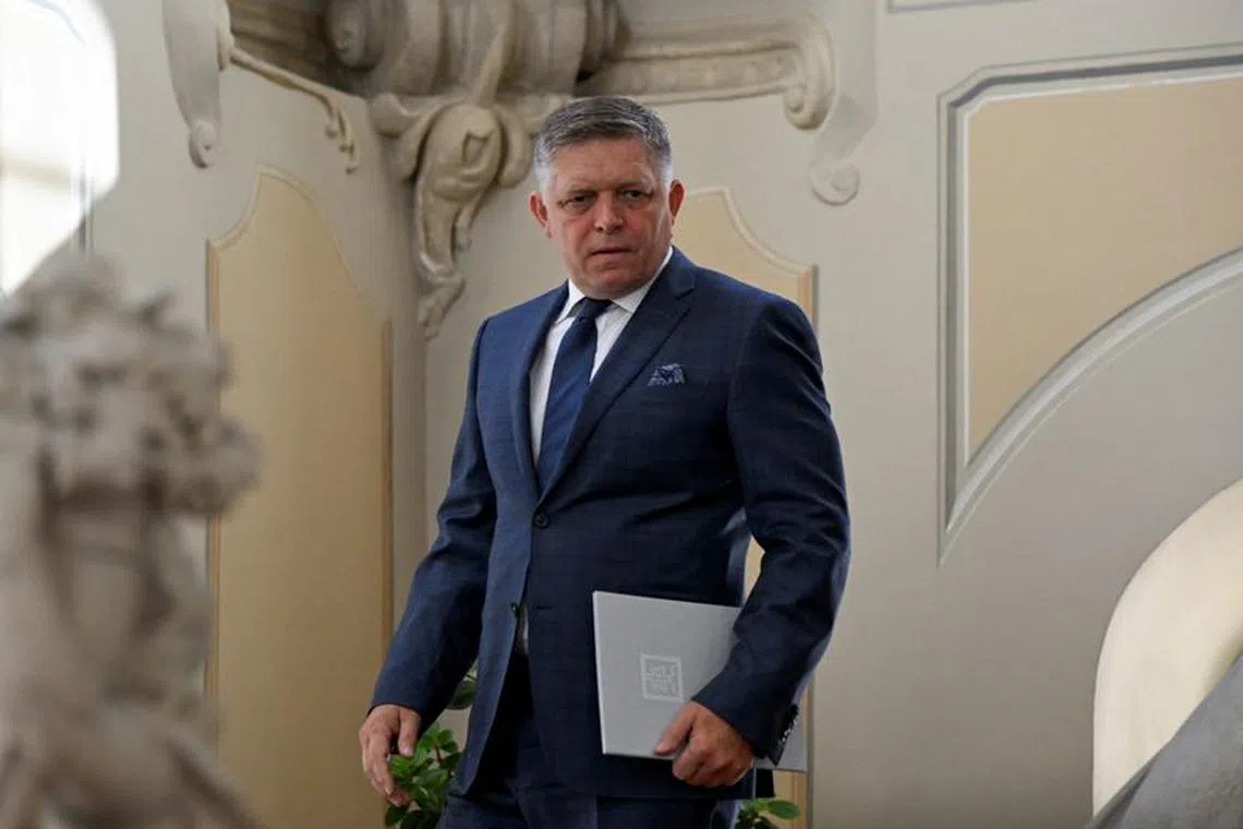 FILE PHOTO: Robert Fico, whose SMER-SSD party won the country's early parliamentary elections, looks on, on the day he meets with Slovak President Zuzana Caputova to receive a political mandate to start negotiations to form a new government, in Bratislava, Slovakia, October 2, 2023. REUTERS/Radovan Stoklasa/File Photo
