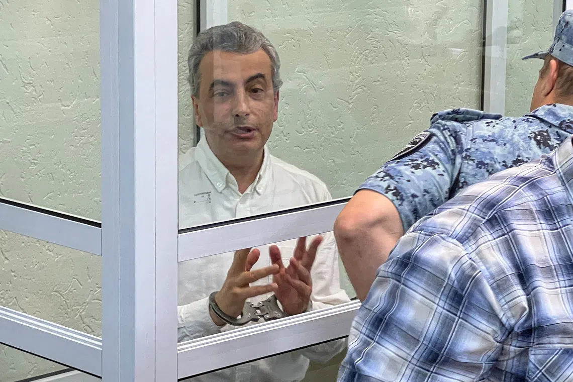 Yabloko party deputy chairman Lev Shlosberg, accused of discrediting Russia's armed forces and spreading false information about them, attends a court hearing in Pskov, Russia, August 17, 2026. REUTERS/Dmitry Vasilyev