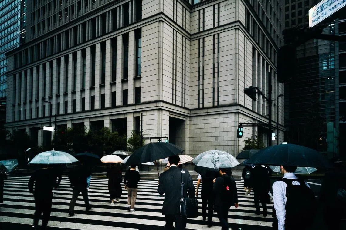 Japan tightens rules for foreigners wanting permanent residency