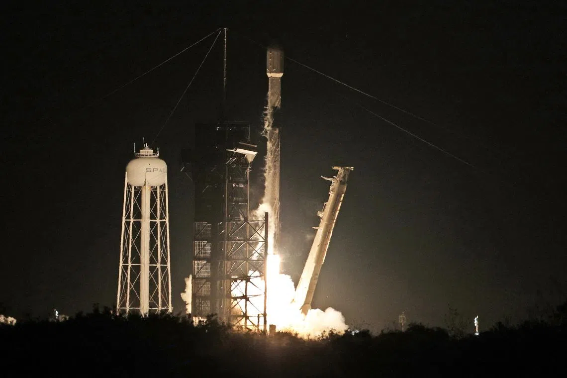Intuitive Machines' Athena lander on top of a SpaceX Falcon 9 rocket, launches toward the moon from NASA's Kennedy Space Center, Florida, on Feb 26.