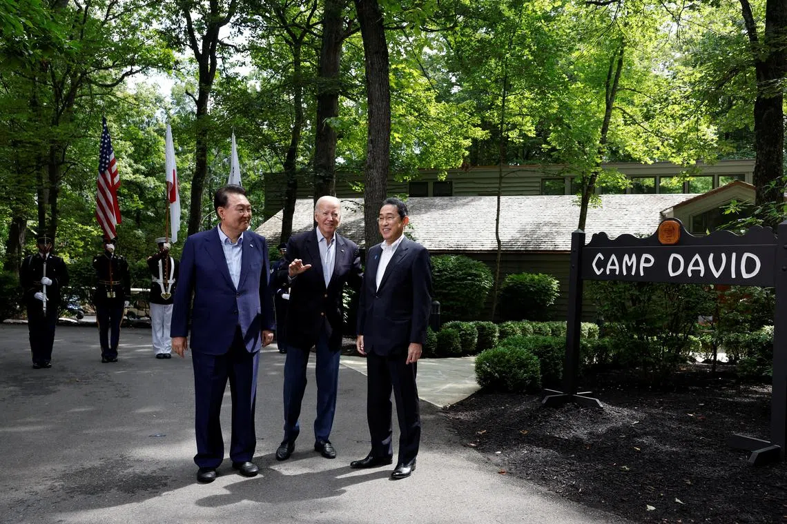 (From left) South Korean President Yoon Suk-yeol, US President Joe Biden and Japanese Prime Minister Fumio Kishida in Camp David, Maryland on Aug 18.
