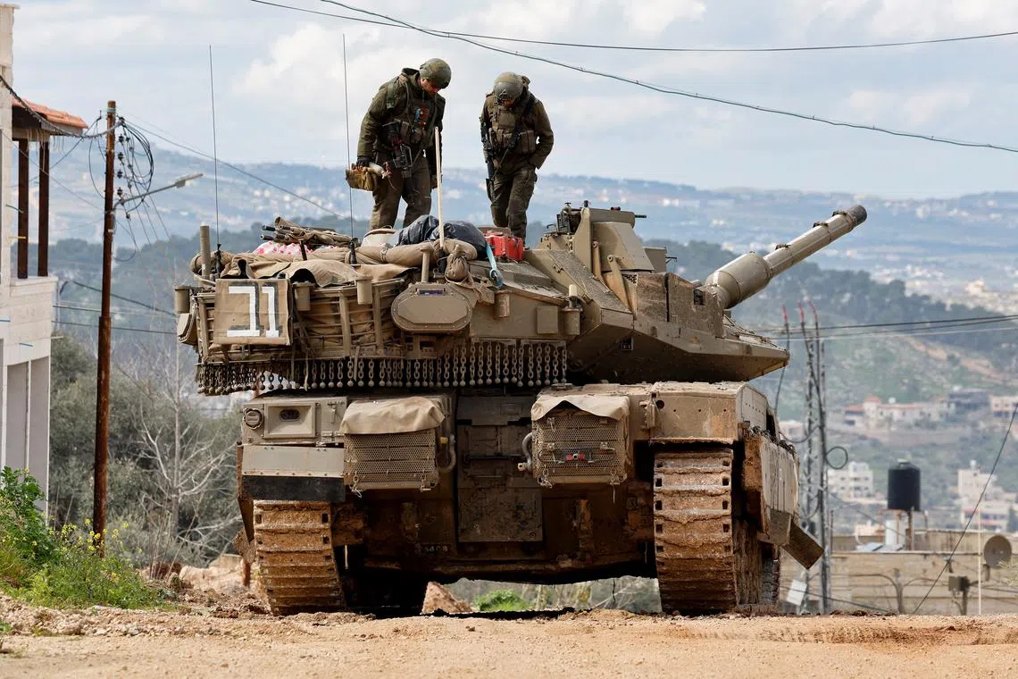 Israeli soldiers take part in an operation near Jenin Camp, in the Israeli-occupied West Bank, February 24, 2025. REUTERS/Raneen Sawafta