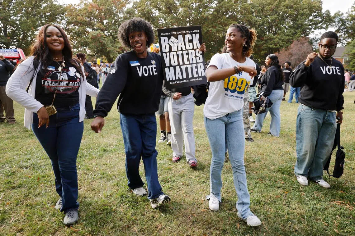 Students at North Carolina A&T State University, the state’s largest Historically Black College and University (HBCU), dance during a campus event encouraging students to vote in the general election, in Greensboro, North Carolina, U.S. October 28, 2024. REUTERS/Jonathan Drake