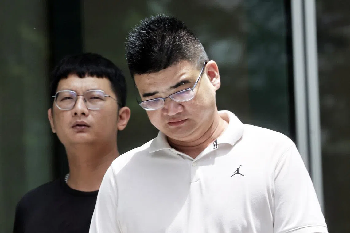 YY E-bike store manager Chu Foo Siang (left) and director Zhang Meng were handed one charge each of providing illegal modification services on a PMD.