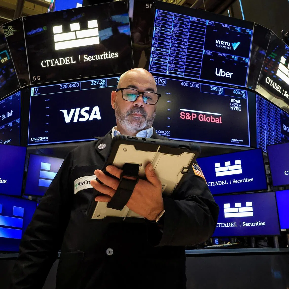 A trader working on the floor of the New York Stock Exchange, in New York City, on June 24.