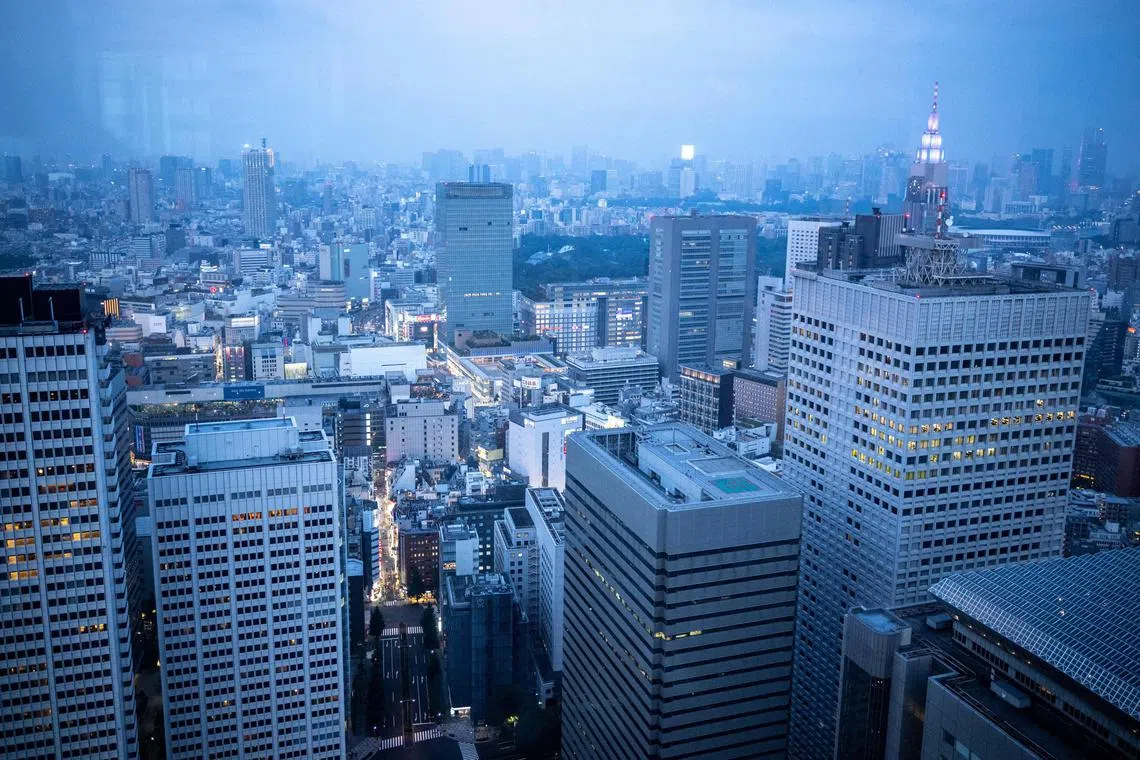 City skyline is seen from Tokyo Metropolitan Government Building Observatories in Tokyo on June 25, 2023. (Photo by Philip FONG / AFP)