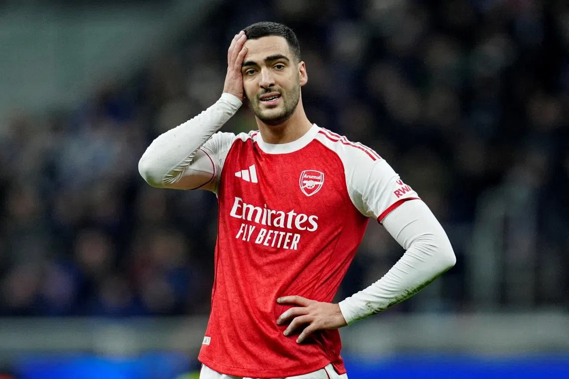 FILE PHOTO: Soccer Football - UEFA Champions League - Inter Milan v Arsenal - San Siro, Milan, Italy - January 20, 2026 Arsenal's Mikel Merino reacts REUTERS/Matteo Ciambelli/File Photo