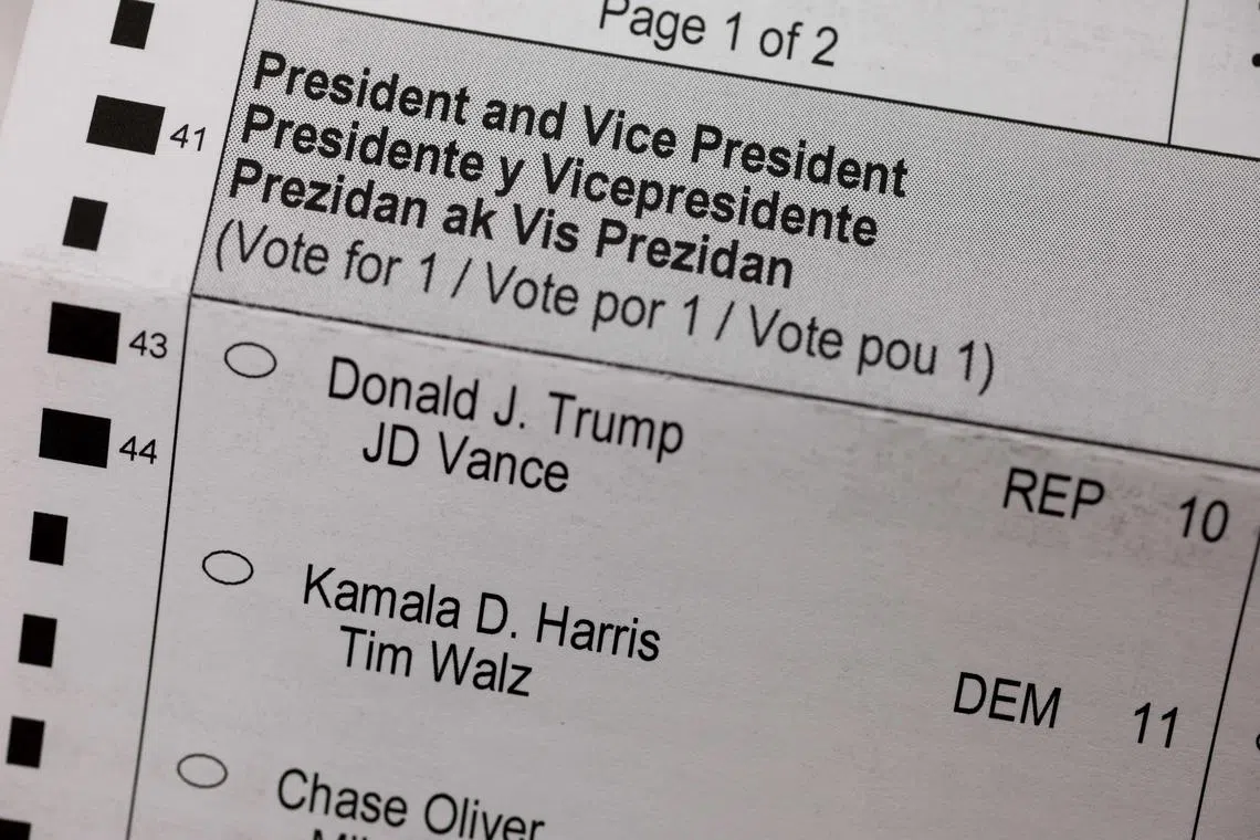 A photo illustration shows the names of the candidates for the 2024 US presidential election on a vote-by-mail ballot in Miami, Florida. 