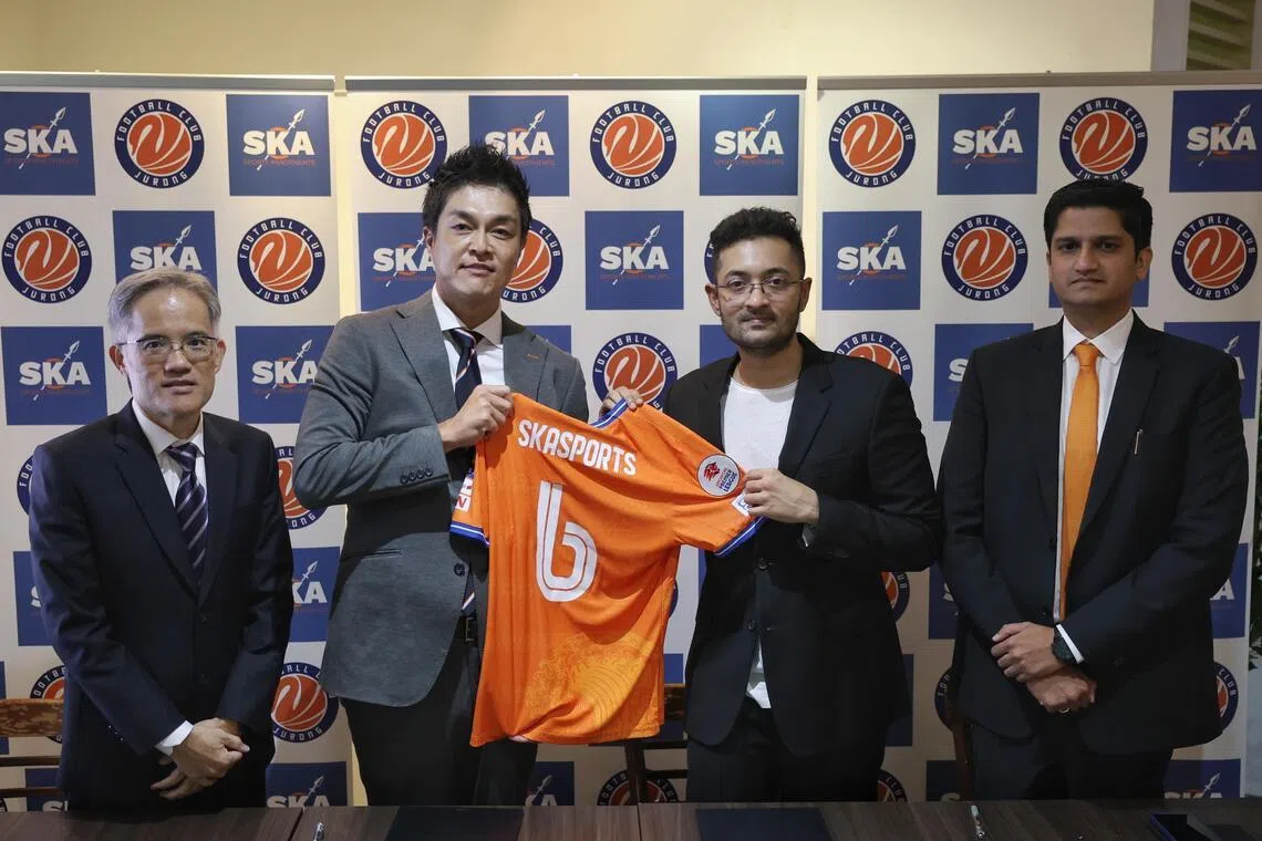 (From left) FC Jurong vice chairman Koh Mui Tee,  chairman Daisuke Korenaga, SKASports Investments directors Rohit Ramesh and Sudhir Menon at the signing of the strategic partnership at Jurong East Stadium on May 16.