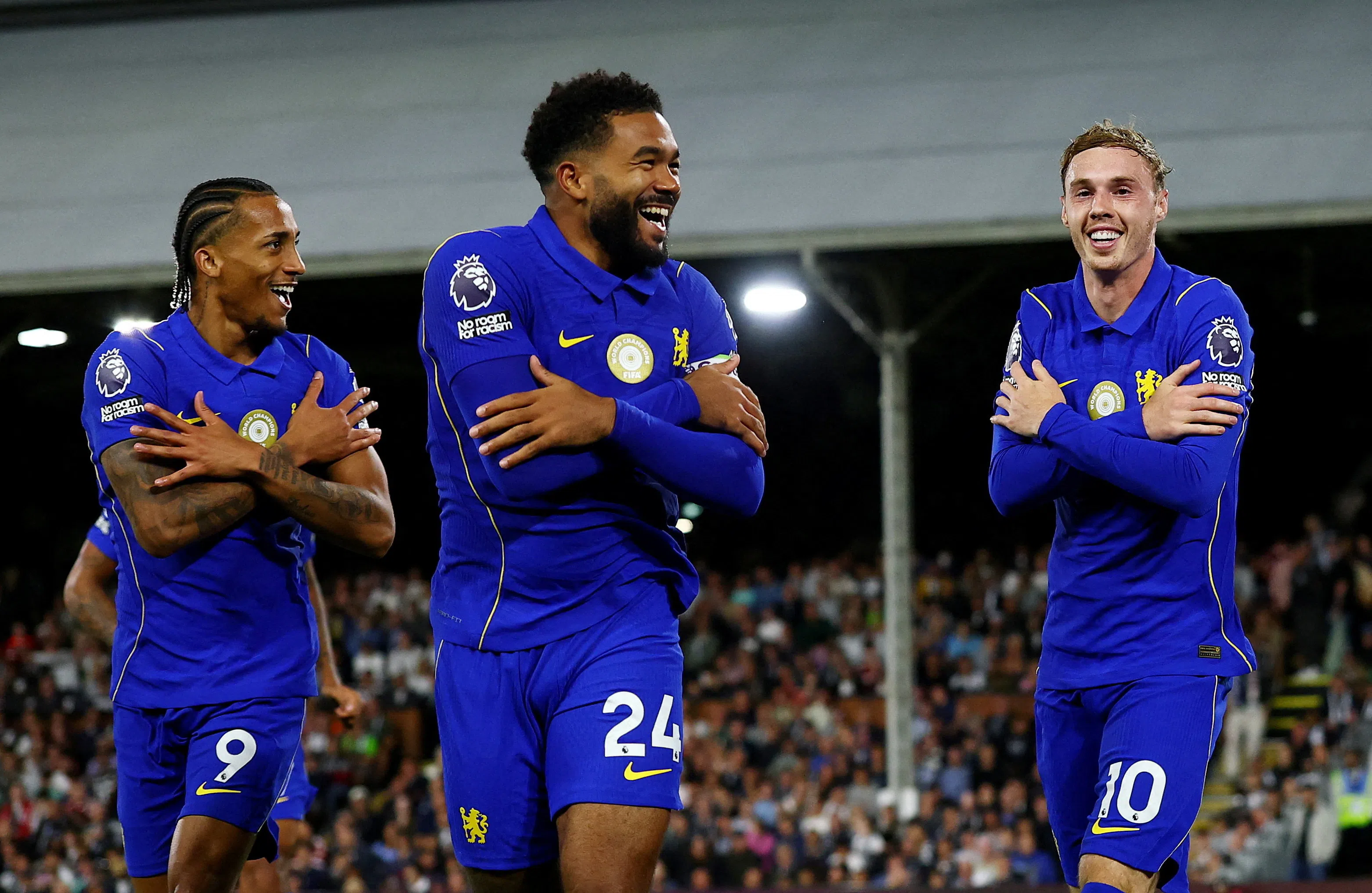 Soccer Football - Premier League - Fulham v Chelsea - Craven Cottage, London, Britain - August 24, 2026 Chelsea's Cole Palmer celebrates scoring their third goal with Joao Pedro and Reece James Action Images via Reuters/Matthew Childs