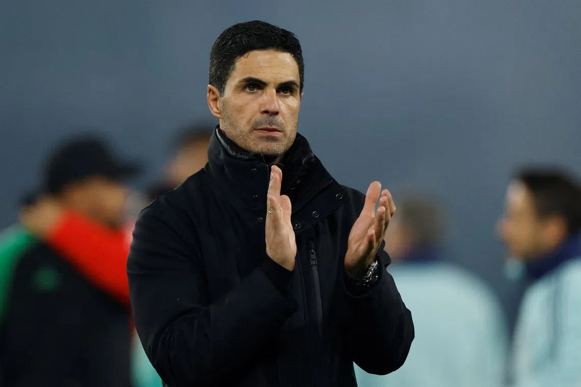FILE PHOTO: Soccer Football - Champions League - Semi Final - Second Leg - Paris St Germain v Arsenal - Parc des Princes, Paris, France - May 7, 2025 Arsenal manager Mikel Arteta looks dejected after the match Action Images via Reuters/Peter Cziborra/File Photo