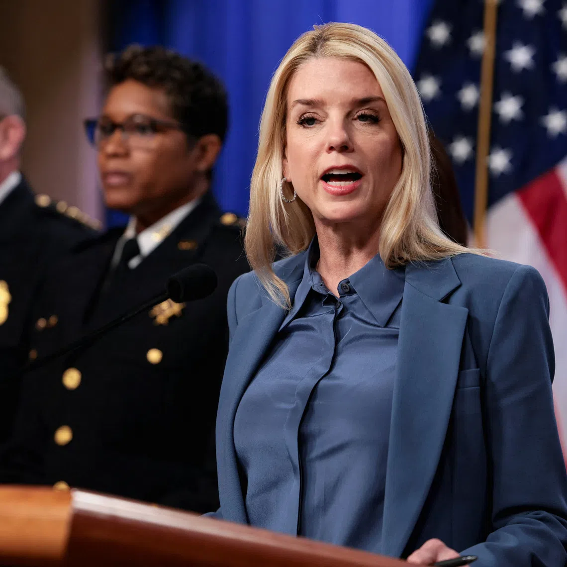 U.S. Attorney General Pam Bondi speaks at a press conference following the arrest in the D.C. pipe bomber investigation, at the Justice Department in Washington, D.C., U.S., December 4, 2025. REUTERS/Jessica Koscielniak