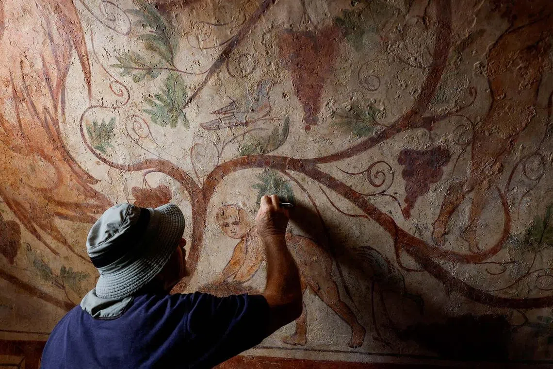 Wall paintings in a vaulted tomb that, according to the Israel Antiquities Authority, dates back 1,700 years to the Roman era, near the beach of Ashkelon, Israel, Aug 27, 2024. 