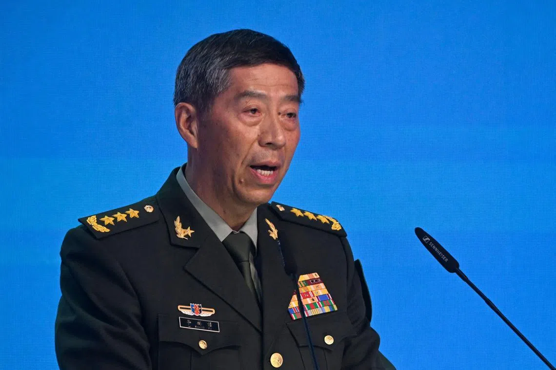 China's Defence Minister Li Shangfu addresses a speech during the Moscow Conference on International Security in Kubinka, in the outskirts of Moscow, on August 15, 2023. Russian defence minister said on August 15, 2023, that Ukraine's military resources were "almost exhausted", despite support from the West. (Photo by Alexander NEMENOV / AFP)