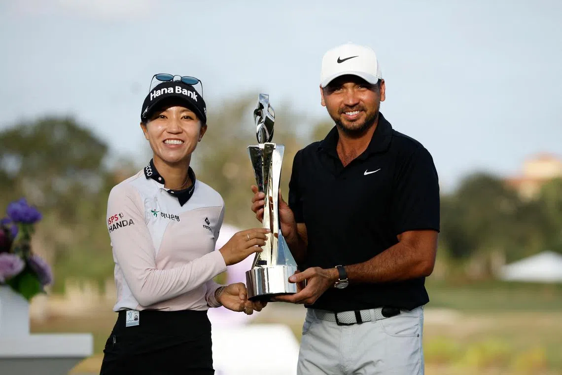 Lydia Ko of New Zealand and Jason Day of Australia celebrating with the trophy after winning the Grant Thornton Invitational at Tiburon Golf Club on Dec 10 in Naples, Florida.