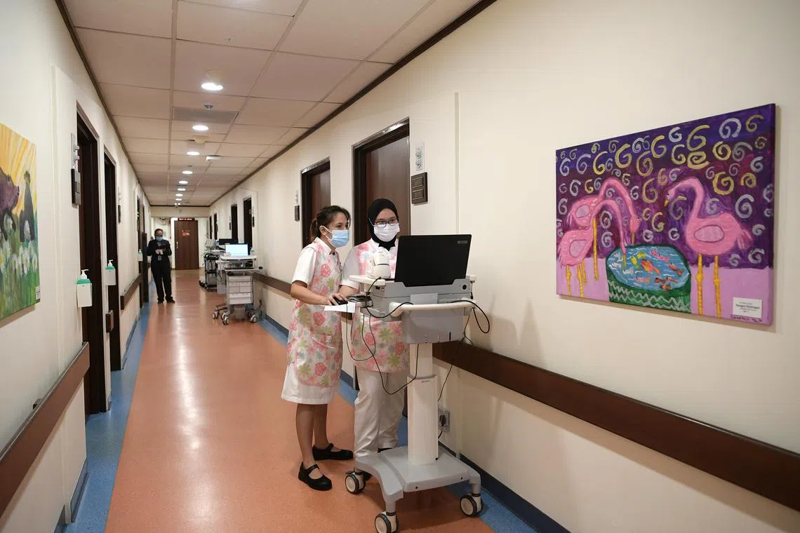Nurses at Parkway East Hospital, a private healthcare facility. There was a 5 per cent drop in the proportion of people who had the highest IP tier, for coverage of treatment in private hospitals.