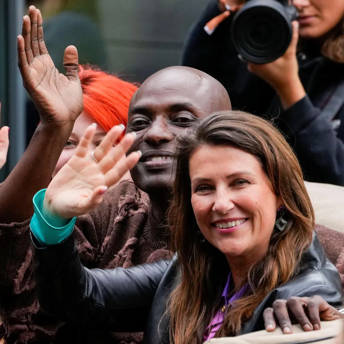 Norway's Princess Martha Louise and Mr Durek Verrett wave as they attend their wedding celebrations in Geiranger, Norway on Aug 30, 2024. 