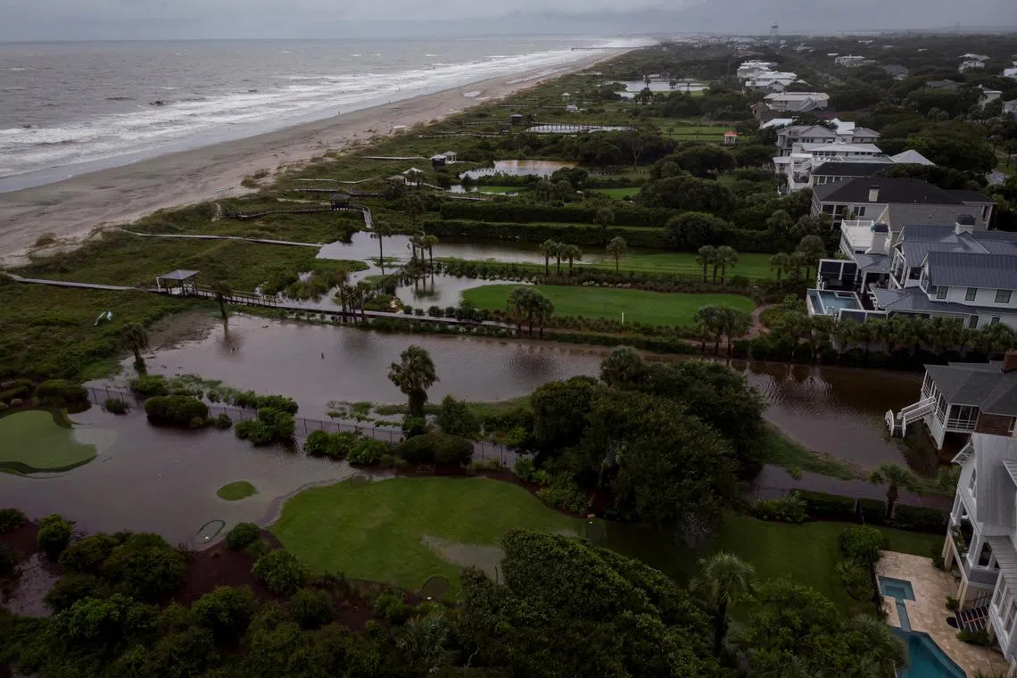 View of flooded beachfront houses yards as Tropical Storm Debby moves off Georgia to the North Atlantic, in Isle of Palms, South Carolina, U.S., August 6, 2024. REUTERS/Marco Bello