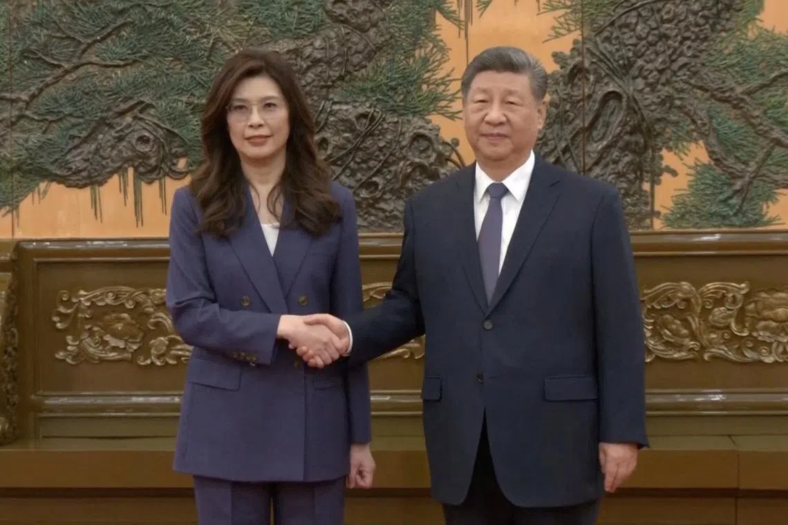 Cheng Li-wun, chairperson of the Kuomintang (KMT), Taiwan's largest opposition party, shakes hands with Chinese President Xi Jinping at the Great Hall of the People in Beijing, China April 10, 2026, in this screengrab from a video provided by CTI. CTI via REUTERS